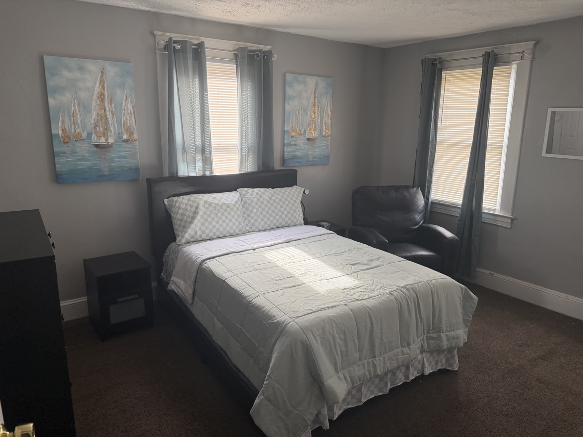 Private resident bedroom with full-size bed
